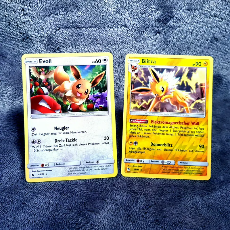 Pokemon - Evoli 48/68 holo & Blitza 23/68 holo - S & M - Hidden Fates - MINT